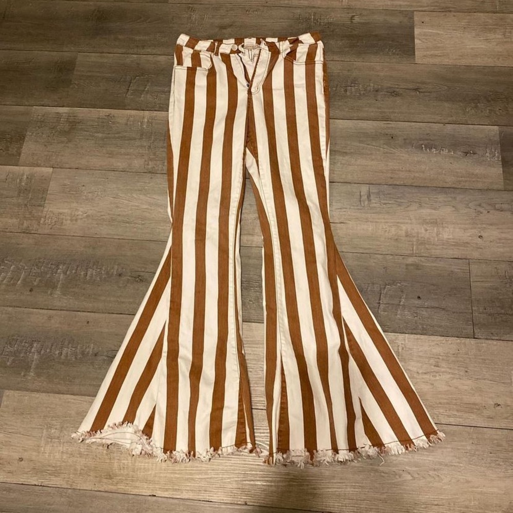 I am selling striped jeans from cavenders. Both of the other jeans, old navy.